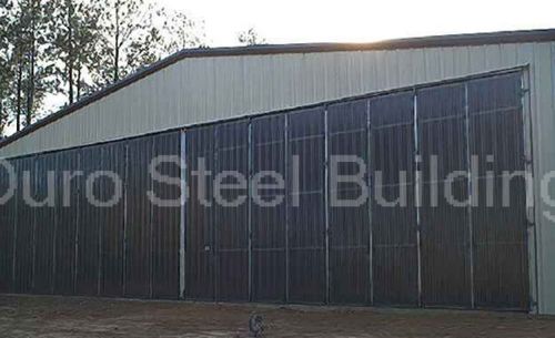 Durosteel 70&#039; w x 20&#039; t metal wind rated insulated airplane stack door direct for sale