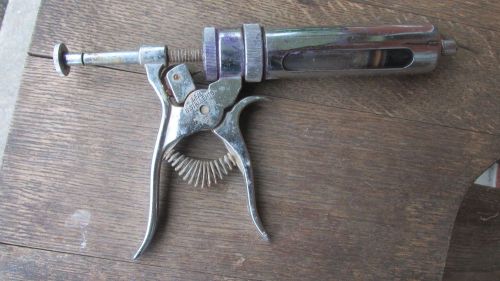 Vintage used ideal c 10 stainless steel syringe gun for sale