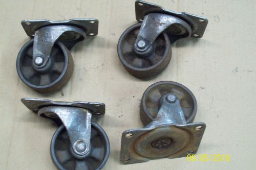 Lot of 4 antique vintage industrial factory caster wheels for sale