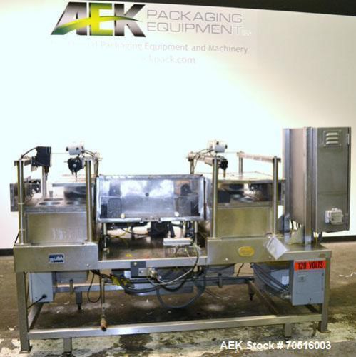 Used- JG Machine Works Hot Pour Tray Filler. Last used in cosmetics hot fill. In