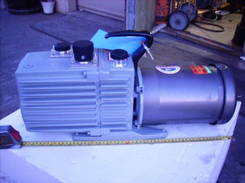 Trivac Rotory Vane Vacuum Pump Model D16A, 1 HP Baldor Motor, a Bottle of Oil