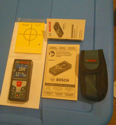 Bosch GLM-50 C in wrapper with unused target cards and manual and case