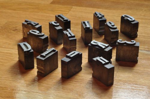 Vintage metal printer blocks 24 letters and numerals for sale