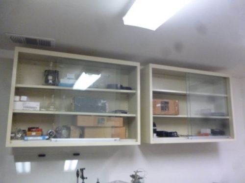 Laboratory wall cabinets, each with two rolling glass doors, l673 for sale