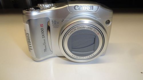 S16: Canon PowerShot SX100 IS 8.0 MP Digital Camera - Silver