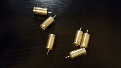Bullet thumbtacks made out of real 9mm brass shells