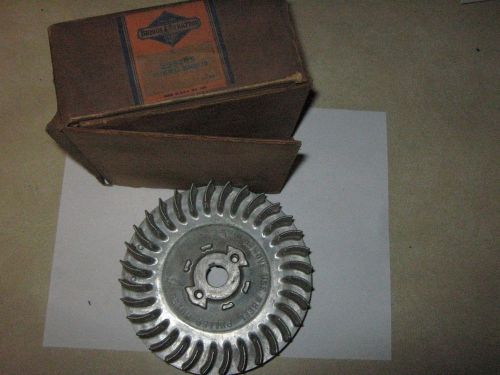 Genuine old briggs &amp; stratton gas engine flywheel 293205 new old stock for sale