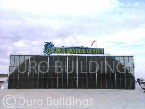 Durosteel 63&#039; w x 18&#039; t metal commercial airplane wind rated stack door direct for sale