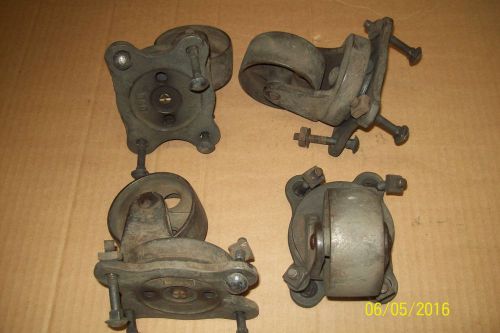 Lot of 4 antique vintage industrial factory swivel caster wheels cast iron for sale