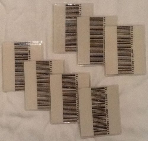 LOT OF 200 USED CHECKPOINT SECURITY SYSTEM BARCODE CARDS HARD TAGS